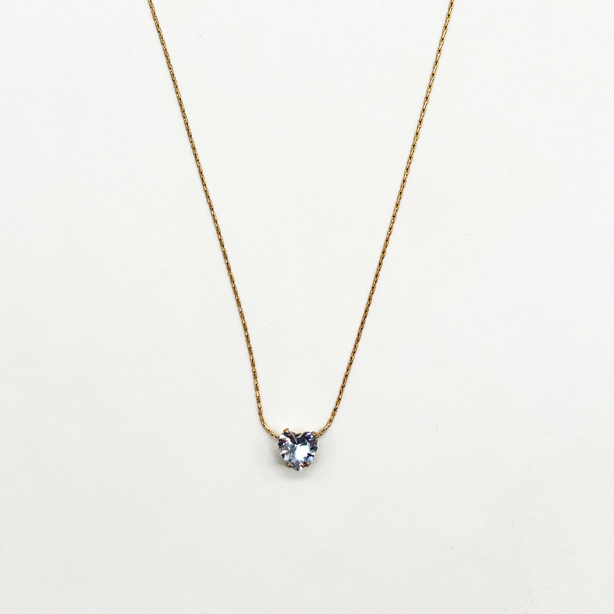 Delicate Heart-Shaped Blue Topaz Pendant Necklace