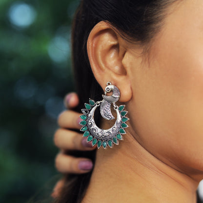 Traditional Oxidized Silver Peacock Design Jhumki Earrings with Vibrant Green Stones